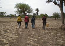Source - Blake Zachary, The DHS Program/ICF International. Description - Field workers walking to a cluster in Ethiopia.  